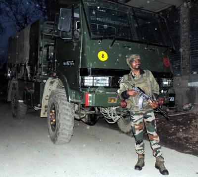 Security forces during an encounter at Gousu Hazratbal in Kashmir