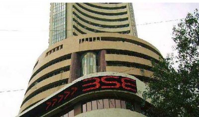 Sensex moves down 703.59 points