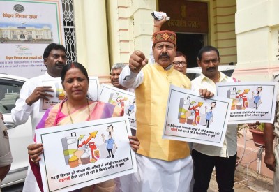 RJD legislators protesting against fuel price hike in Patna