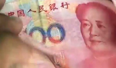 Chinese yuan hits record low against USD