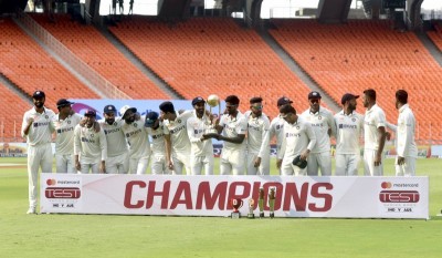 Indian team with trophy after test series win against Australia in Ahmedabad