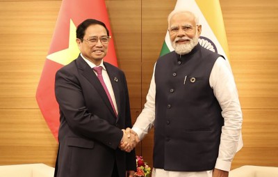 G7: PM Modi meets Vietnamese counterpart  Pham Minh Chinh, agrees to enhance  high-level exchanges