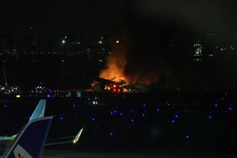 Japan Airlines flight catches fire after landing at Tokyo's Haneda Airport