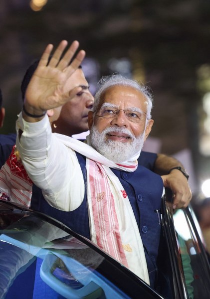 PM Modi waves at crowd in Guwahati