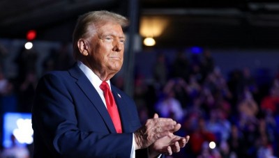 After campus shootings, Trump suspends green card lottery programme