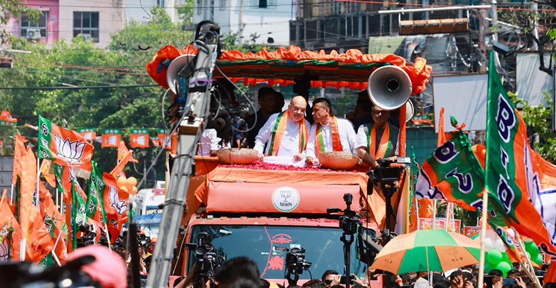 In Images: Amit Shah holds roadshow for BJP candidates in Kolkata