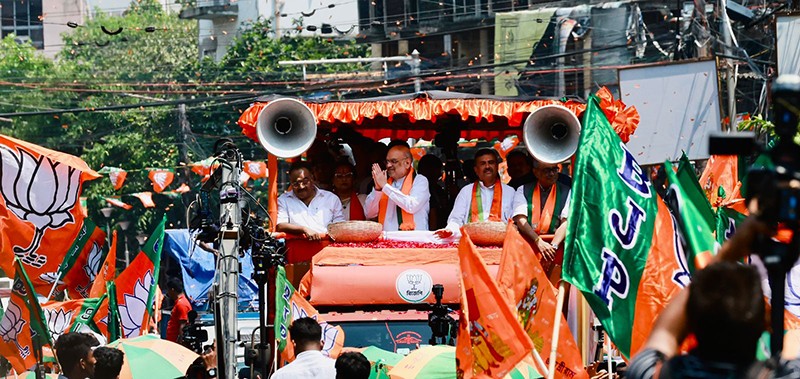 In Images: Amit Shah holds roadshow for BJP candidates in Kolkata
