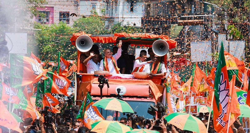 In Images: Amit Shah holds roadshow for BJP candidates in Kolkata