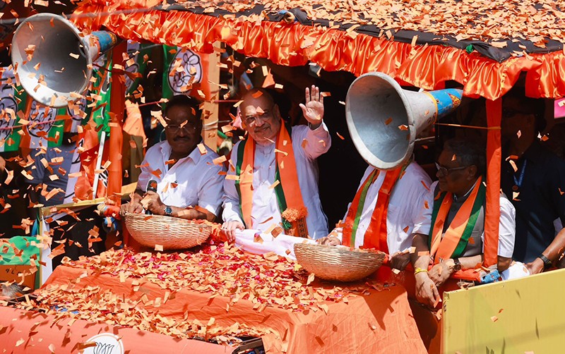 In Images: Amit Shah holds roadshow for BJP candidates in Kolkata