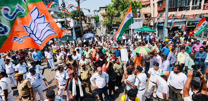 In Images: Amit Shah holds roadshow for BJP candidates in Kolkata