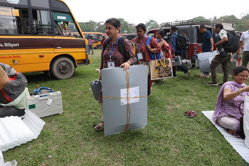 Phase 1 of Bengal polls tomorrow; polling personnel collect EVMs, other materials from a Siliguri dispersal centre
