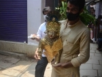 People in Varanasi taking home Laddoo Gopal idols on Janmashtami