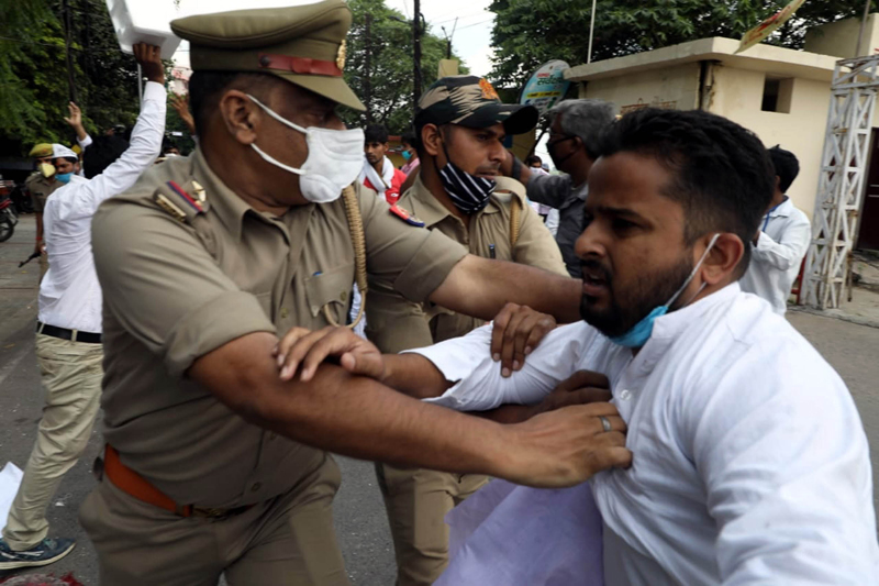 Police detain Aam Admi Party (AAP) workers during protest against the NEET- JEE examination