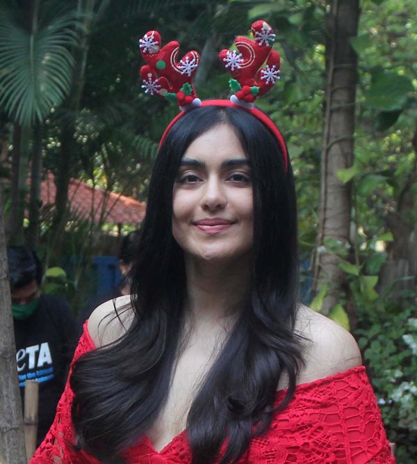 Adah Sharma dresses as Santa Claus