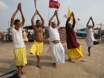 Devotees performing Yoga on the occasion of International Yoga Day