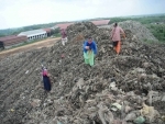 Agartala: Ragpickers collect recyclable materials from garbage dump