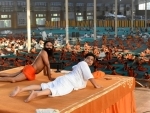 Swami Ramdev, Achariya Balakrishna perform Yoga with followers at Haridwar