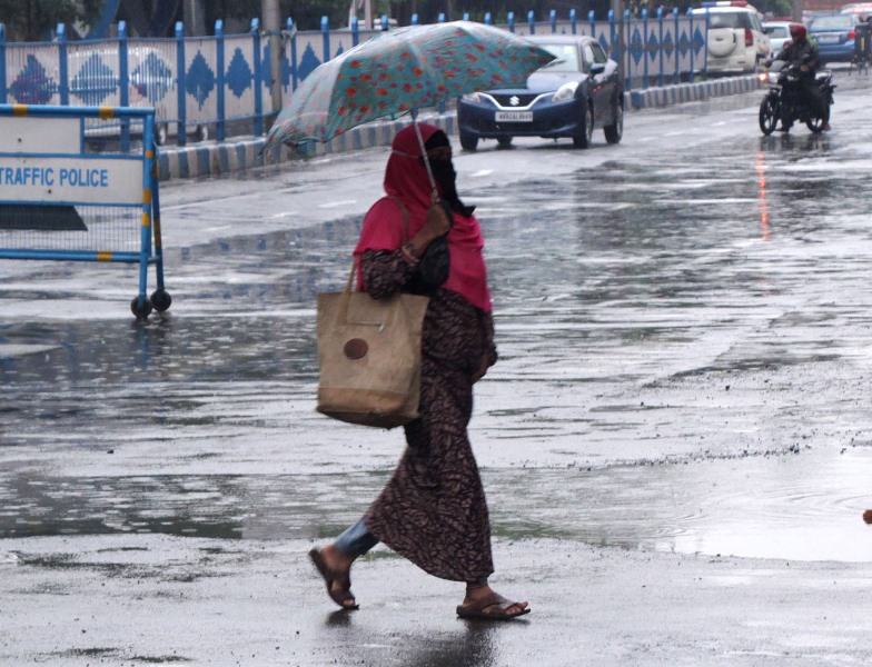 Glimpses of rain splashed Kolkata roads