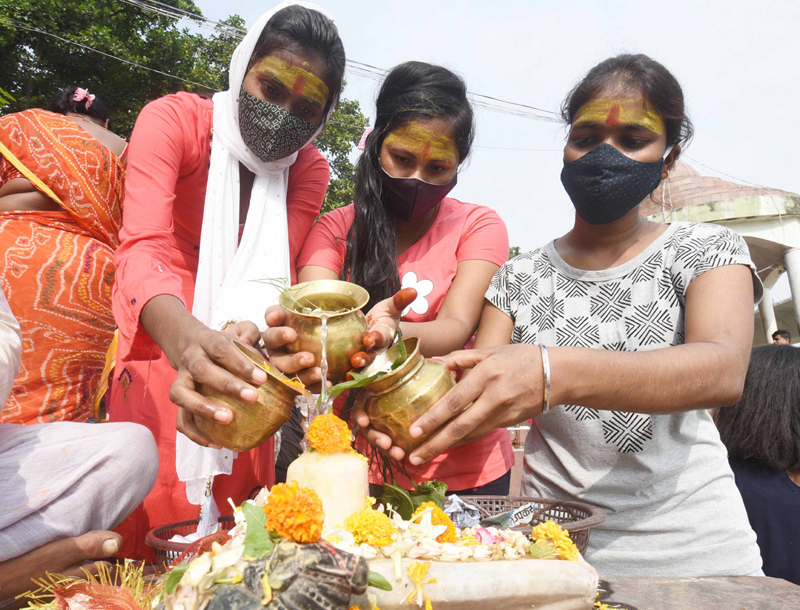 Hindu devotees pray to Lord Shiva