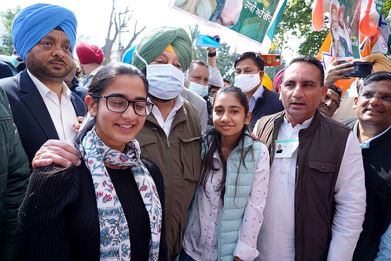 Punjab polls: People wait in queue to cast their votes