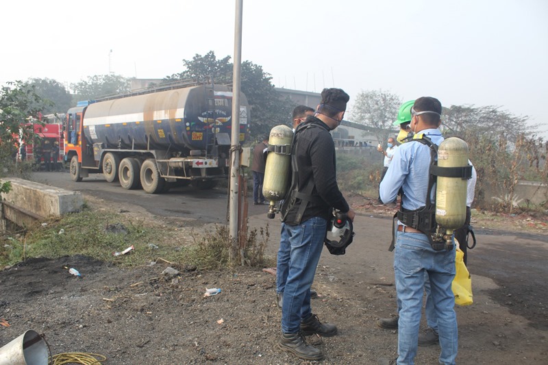 Officials clearing the site of chemical leak from tanker in Gujarat's Surat