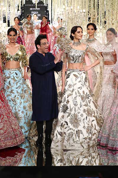 India Couture Week: Models walk the ramp for designer Suneet Verma