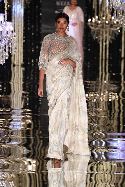 India Couture Week: Models walk the ramp for designer Suneet Verma