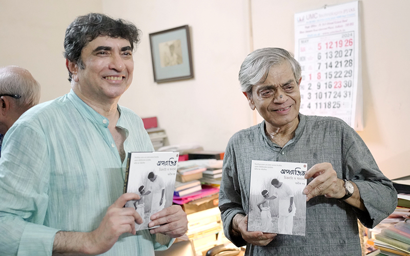 Sandip Ray launches Anik Dutta's collection of screenplay of Aparajito on Satyajit Ray's birth anniversary