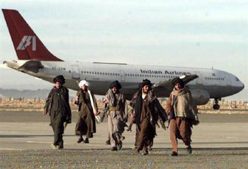 Terrorists before the hijacked plane (Flight IC 814) in 1999. Photo: Wikipedia Creative Commons 