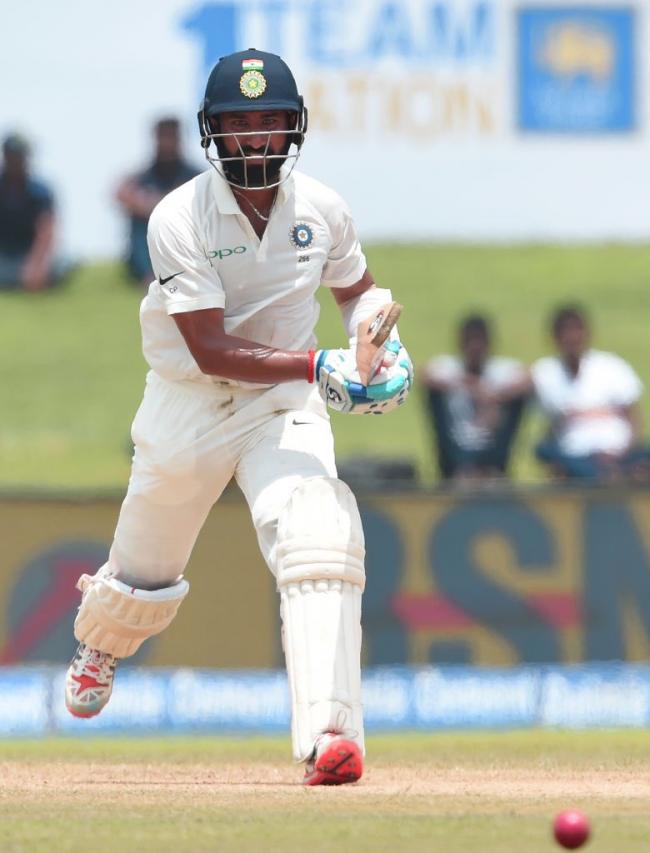 SLTest: Pujara, Dhawan help India post 399-3 on first day 