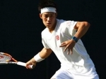 Japan's Kei Nishikori defeats Ivo Karlovic to reach Australian Open third round