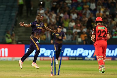 Russell show helps Kolkata Knight Riders to stay alive in IPL playoff hunt