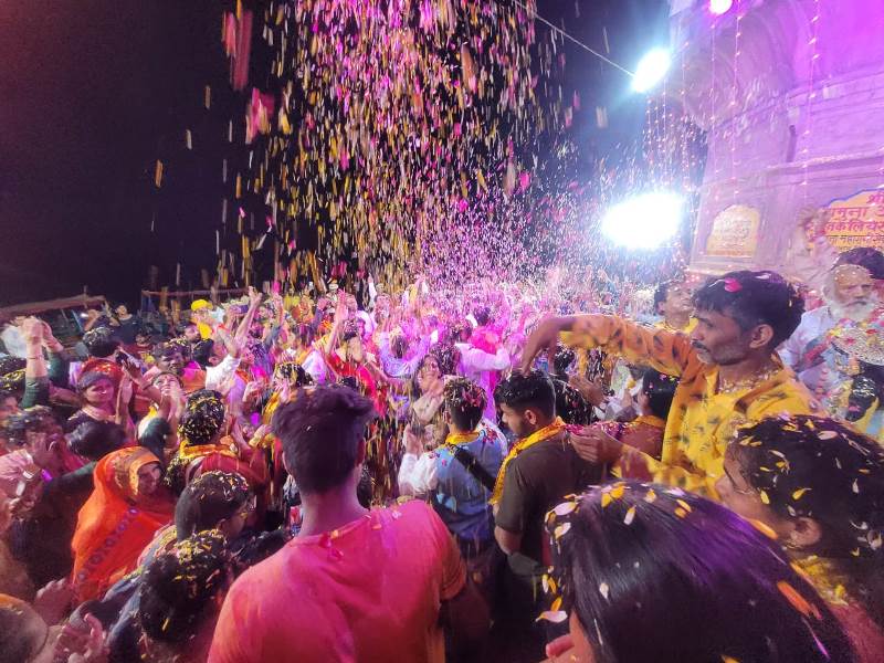 Flower Holi at Yamuna ghat in Vrindavan