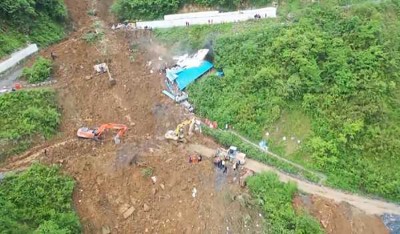 Toll from mountain landslide in southwest China rises to 19