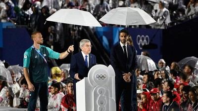 'Dream with us': IOC President delivers message of hope as rain fails to dampen Paris Olympics' unique style opening ceremony