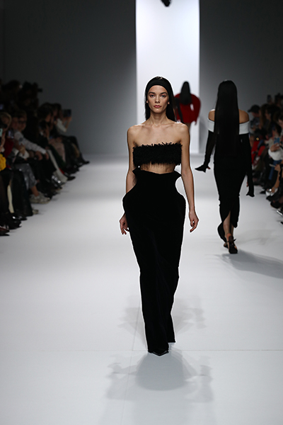 Models walk the ramp for THEUNISSEN at the Paris Fashion Week