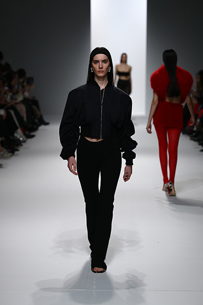 Models walk the ramp for THEUNISSEN at the Paris Fashion Week