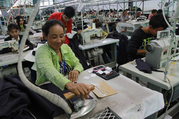 UN agency calls on global clothing brands to help Cambodian manufacturers absorb wage hike