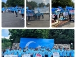 USA: Uyghur community members demonstrate outside Chinese Embassy in Washington DC to mark 15th anniversary of Urumqi Massacre